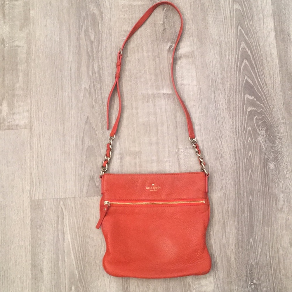 Kate Spade leather orange crossbody purse.